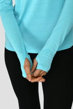 Women's Draft 1/4 Zip - Neon Sky 11 Women's Draft 1/4 Zip - Neon Sky -Sports Clothing Store DRAFT1 4ZIP NEONSKY SLEEVEDETAIL