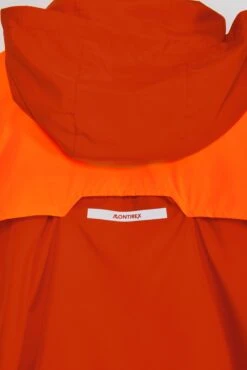 Junior Speed Windbreaker - Cardinal Red/Fiery Orange -Sports Clothing Store SPEED WINDBREAKER CARDINAL RED FIERY ORANGE logo windflap detail