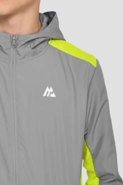 Junior Speed Windbreaker - Platinum Grey/Electric Lime -Sports Clothing Store SPEED WINDBREAKER PLATINUM GREY ELECTRIC LIME logo