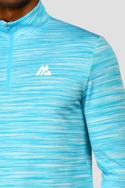 Trail 2.0 1/4 Zip - Neon Blue/White -Sports Clothing Store TRAIL 1 4 ZIP BLUEFISH ATOMIC BLUE WHITE logo detail