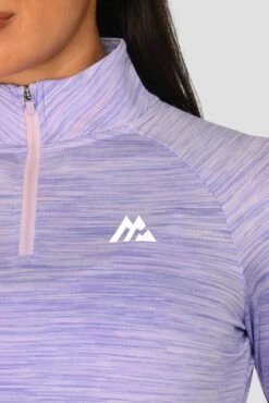 Women's Trail 2.0 1/4 Zip - Lilac Multi 11 Women's Trail 2.0 1/4 Zip - Lilac Multi -Sports Clothing Store TRAIL 2.0 1 4 ZIP LILAC BLOOM MAGNOLIA PEARLY HEATHER AMETHYST logo detail