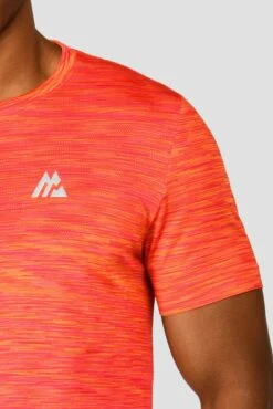 Trail Seamless T-Shirt - Fiery Orange/Hot Pink/Hibiscus -Sports Clothing Store TRAIL SEAMLESS TEE FIERY ORANGE HOT PINK HIBISCUS logo